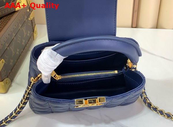 Louis Vuitton Capucines Mini Handbag in Navy Blue Lambskin Leather with Monogram Flowers Motif Replica