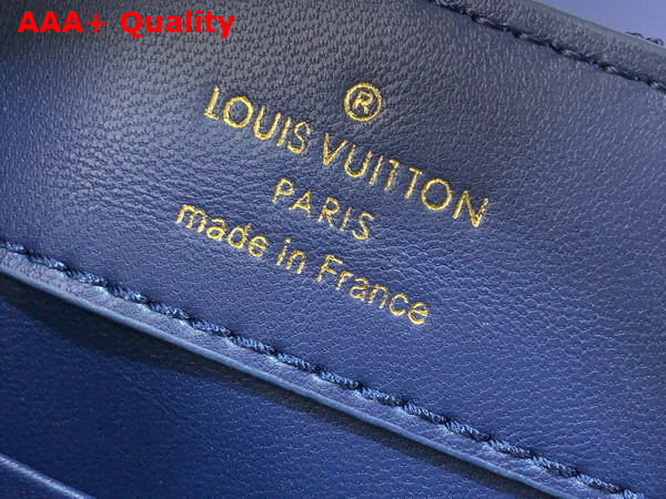 Louis Vuitton Capucines Mini Handbag in Navy Blue Lambskin Leather with Monogram Flowers Motif Replica