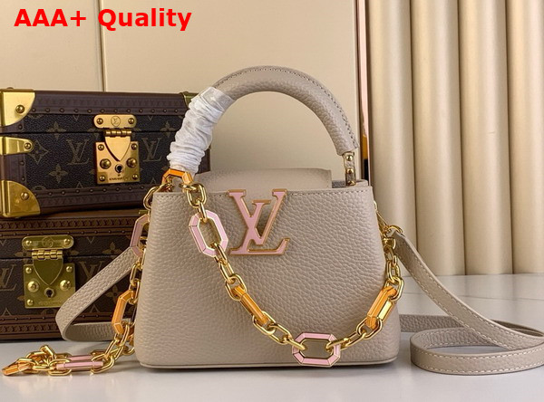 Louis Vuitton Capucines Mini Handbag in Quartz White Taurillon Leather The Links are Decorated with Jewel Like Enamel Replica
