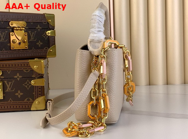 Louis Vuitton Capucines Mini Handbag in Quartz White Taurillon Leather The Links are Decorated with Jewel Like Enamel Replica