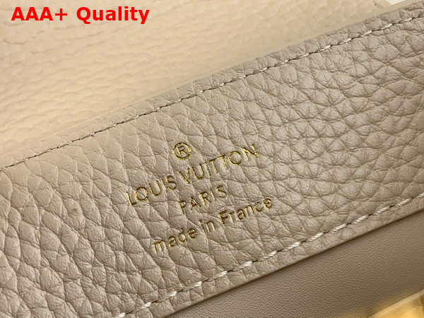 Louis Vuitton Capucines Mini Handbag in Quartz White Taurillon Leather The Links are Decorated with Jewel Like Enamel Replica