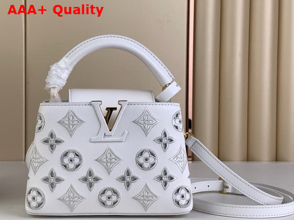 Louis Vuitton Capucines Mini Handbag in Snow White Calfskin Perforated with the Monogram Pattern Replica