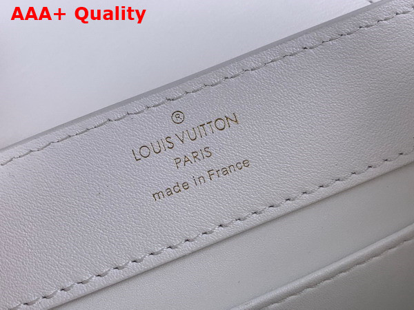 Louis Vuitton Capucines Mini Handbag in Snow White Calfskin Perforated with the Monogram Pattern Replica