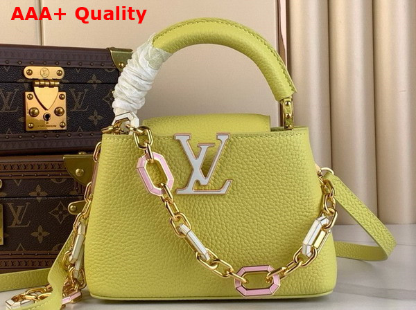 Louis Vuitton Capucines Mini Handbag in Sun Beam Yellow Taurillon Leather Features a Joyfully Arty Enameled Chain M25232 Replica