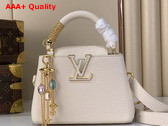 Louis Vuitton Capucines Mini Handbag in Vanille Taurillon Leather Embellished with Tonal LV Initials and a Decorative Stone Embellished Charm Replica
