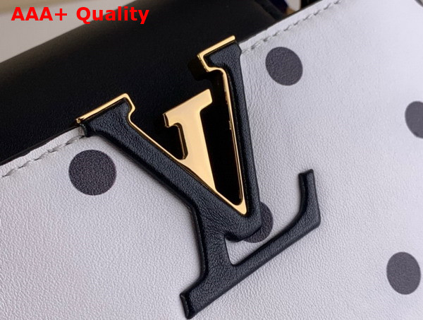 Louis Vuitton Capucines Mini Handbag in White Calfskin with a Graphic Pattern of Black Polka Dots Replica