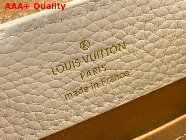 Louis Vuitton Capucines Mini Handbag with a Removable Tassel Charm Cream Arizona Beige Taurillon Leather Replica