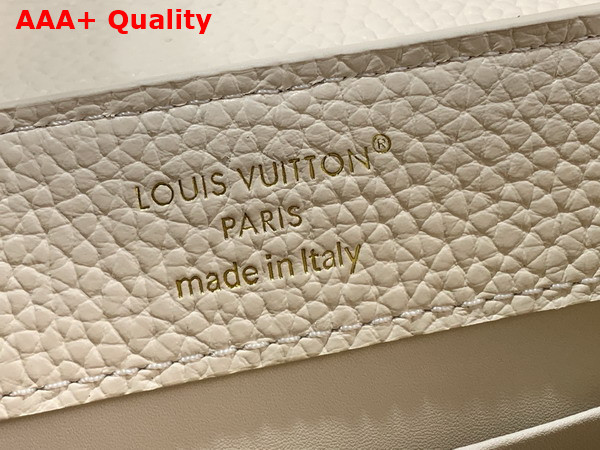 Louis Vuitton Capucines Mini in Vanilla Taurillon Leather with Chain Charm Replica