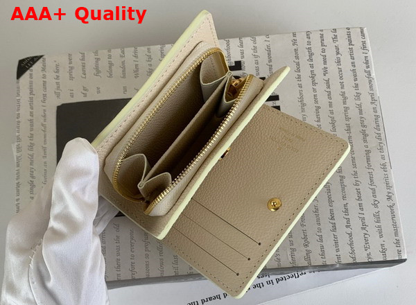 Louis Vuitton Clea Wallet Bicolor Monogram Empreinte Leather Creme Rose Trianon M81927 Replica