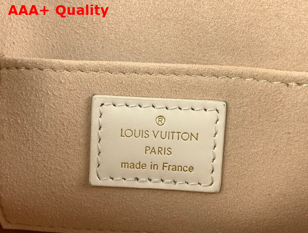 Louis Vuitton Dauphine East West Handbag in Beige Lambskin Patterned with Cut Out Monogram Motif M22955 Replica