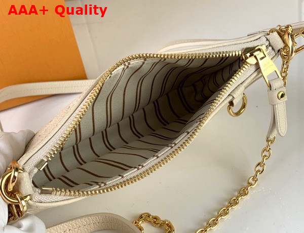 Louis Vuitton Eeasy Pouch On Strap Creme Monogram Empreinte Leather M81066 Replica