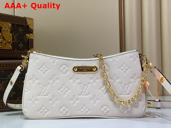 Louis Vuitton Liv Pochette Creme Monogram Empreinte Leather M3A838 Replica