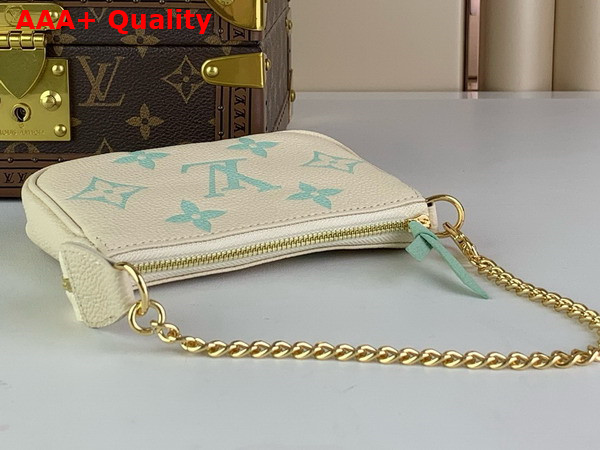 Louis Vuitton Mini Pochette Accessoires Beige and Turquoise Monogram Empreinte Leather Replica