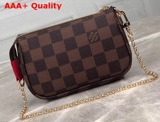 Louis Vuitton Mini Pochette Accessoires Damier Ebene Canvas with a Print of Vivienne LV World Tour Replica