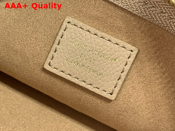 Louis Vuitton Neverfull MM Monogram Empreinte Couture Leather Hazelnut Couture M29486 Replica