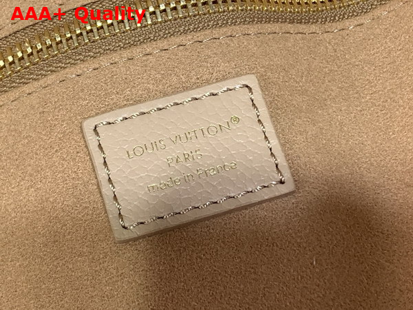 Louis Vuitton Neverfull MM Monogram Empreinte Couture Leather Hazelnut Couture M29486 Replica