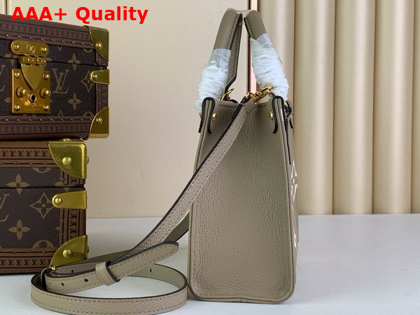 Louis Vuitton Onthego BB Dove Gray Cream Bicolor Monogram Empreinte Leather M47054 Replica