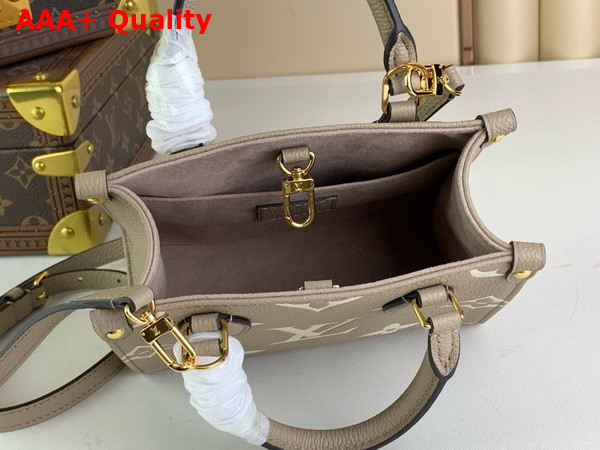 Louis Vuitton Onthego BB Dove Gray Cream Bicolor Monogram Empreinte Leather M47054 Replica