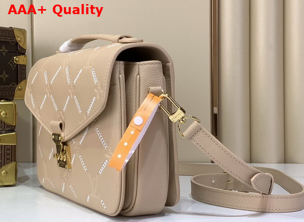 Louis Vuitton Pochette Metis MM Hazelnut Couture Monogram Empreinte Leather M29497 Replica