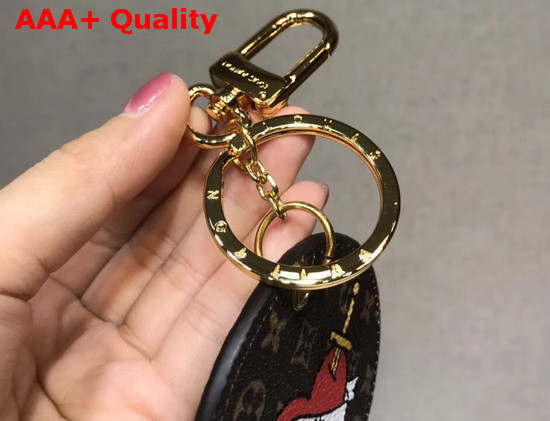 Louis Vuitton Round Bag Charm and Key Holder with Printed Patches Replica