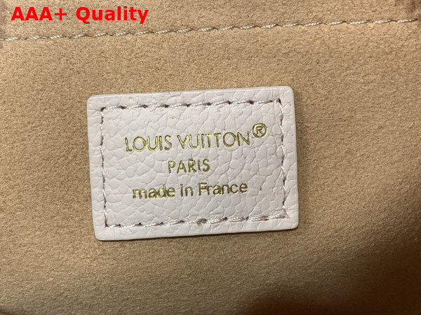 Louis Vuitton Speedy Bandouliere 20 Monogram Empreinte Couture Leather Light Bliss Couture M28529 Replica