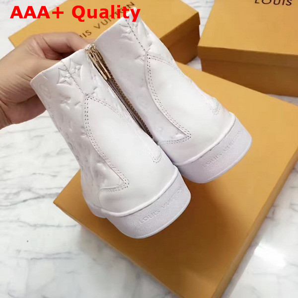 Louis Vuitton Stellar Sneaker Boot in White Monogram Embossed Calf Leather Features a Side Zip for Easy Fitting 1A2XPK Replica