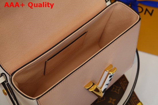 Louis Vuitton Twist MM Handbag in Pink Epi Grained Leather Features a LV Twist Lock Decorated with Tortoise Shell and Black and White Stones Replica