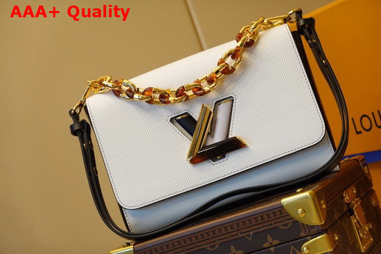 Louis Vuitton Twist MM Handbag in White Epi Grained Leather Features a LV Twist Lock Decorated with Tortoise Shell and Black and White Stones M58526 Replica