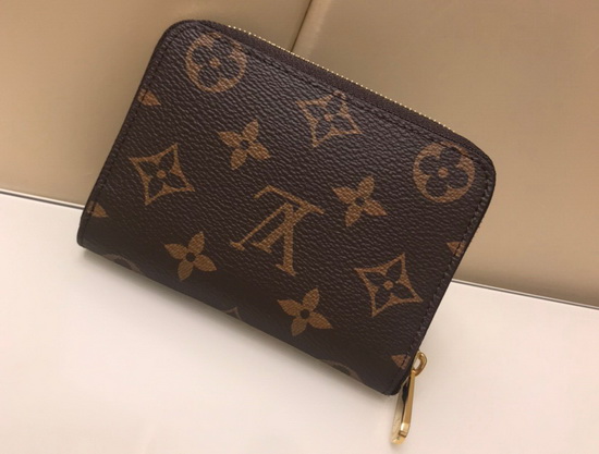 Louis Vuitton Zippy Coin Purse in Monogram Canvas Featuring House Symbols Show Vivienne Enjoying Herself at a Funfair M69745 Replica