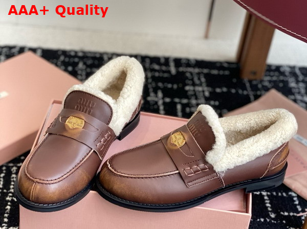 Miu Miu Bleached Leather and Shearling Penny Loafers in Ebony 5D530E Replica