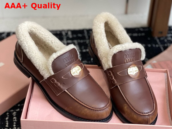 Miu Miu Bleached Leather and Shearling Penny Loafers in Ebony 5D530E Replica