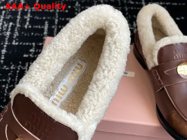 Miu Miu Bleached Leather and Shearling Penny Loafers in Ebony 5D530E Replica