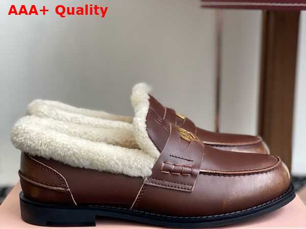 Miu Miu Bleached Leather and Shearling Penny Loafers in Ebony 5D530E Replica