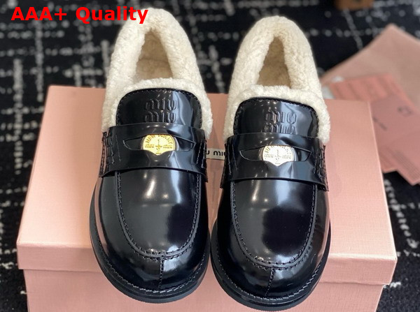 Miu Miu Brushed Leather and Shearling Penny Loafers in Black 5D530E Replica