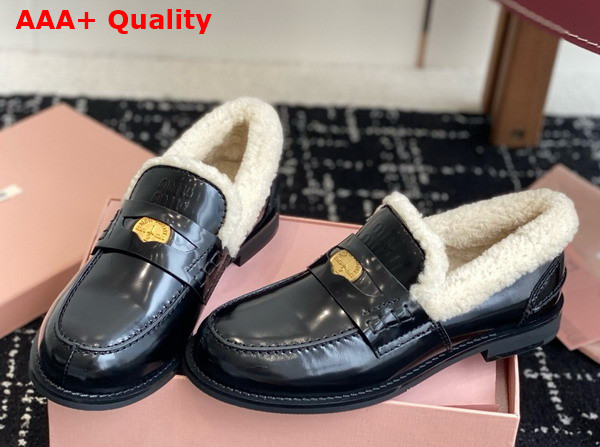 Miu Miu Brushed Leather and Shearling Penny Loafers in Black 5D530E Replica