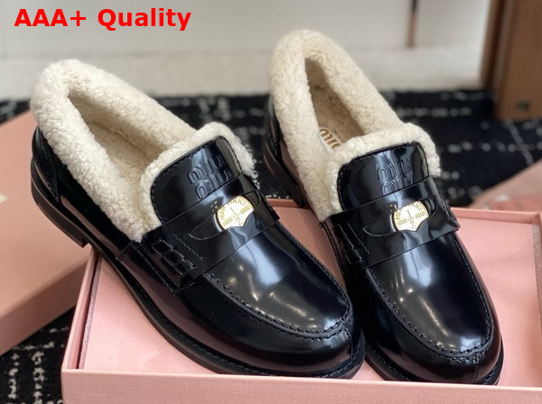 Miu Miu Brushed Leather and Shearling Penny Loafers in Black 5D530E Replica