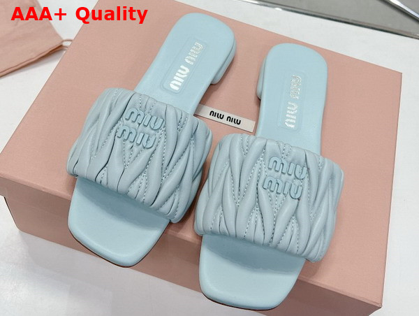 Miu Miu Matelasse Nappa Leather Slides in Light Blue 5XX605 Replica