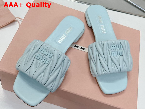 Miu Miu Matelasse Nappa Leather Slides in Light Blue 5XX605 Replica