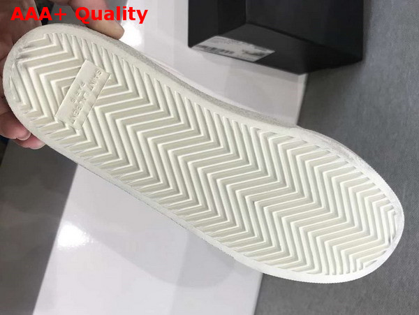 Saint Laurent Court Classic sl06 Sneakers Embroidered with Saint Laurent in White Worn Look Fabric and Leather Replica