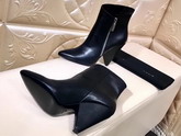 Saint Laurent Niki 105 Asymmetrical Ankle Boot in Black Leather with Structural Cone Heel For Sale