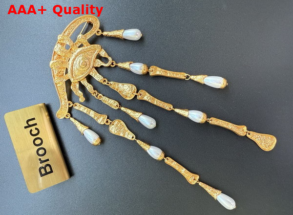 Schiaparelli Eye and Teardrops Brooch in Textured Gold Brass and Pearls Replica